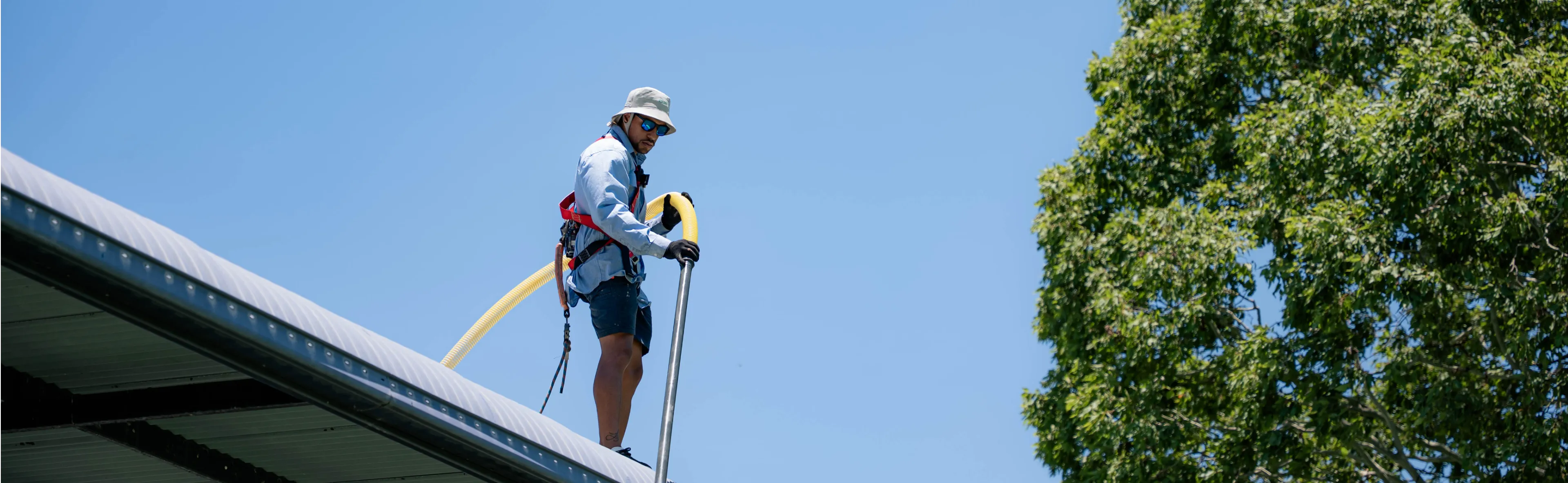 Team doing a gutter cleaning job